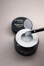 Foksha Builder Gel container with a spatula on a neutral background