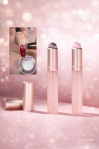 Makeup products with a pink glittery background
