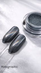 Holographic nail polish with two applied nails on a white background