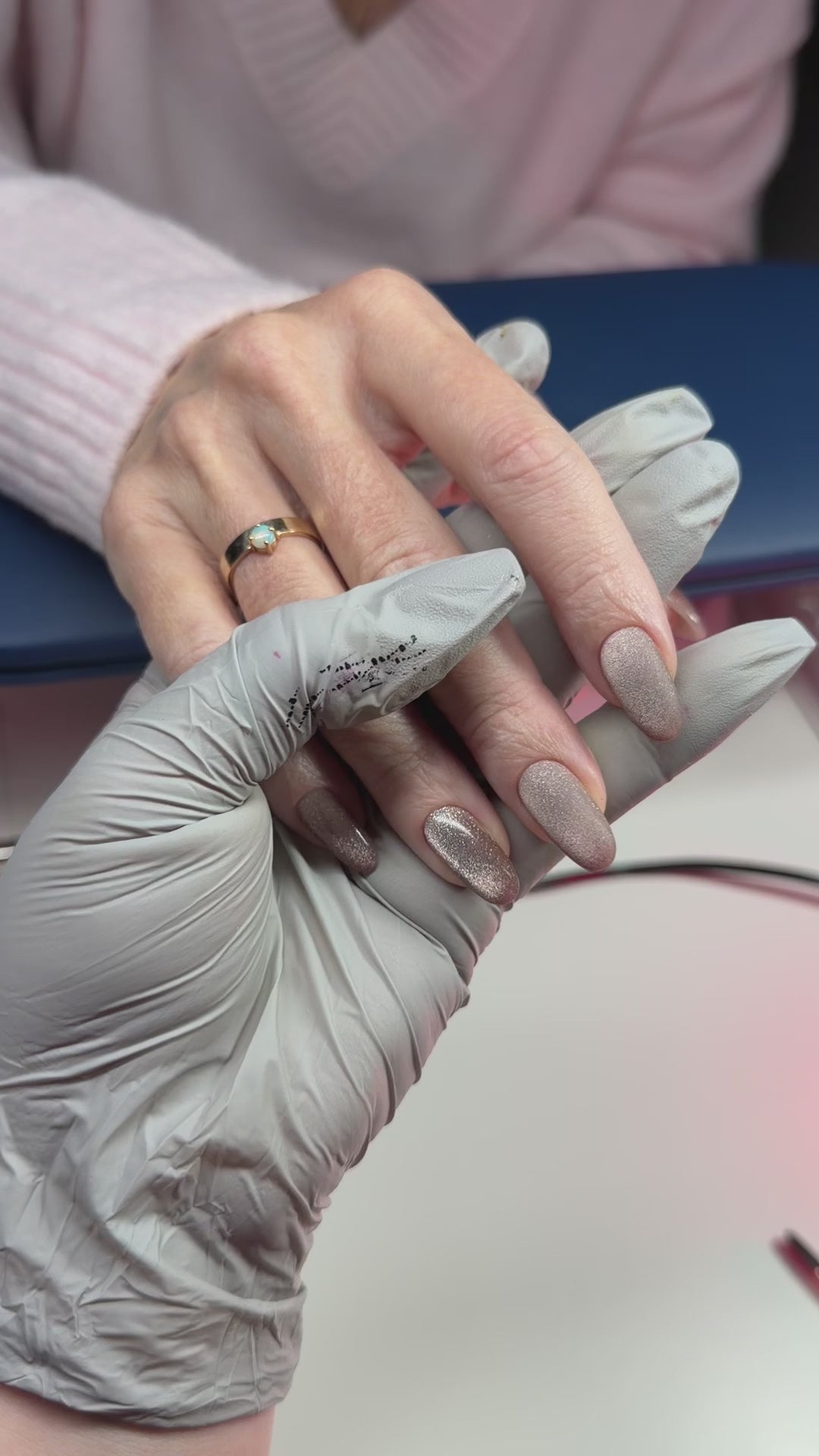 110 Cat Eye gel polish nails on a hand 